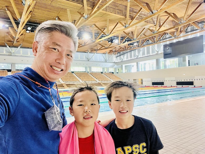 Poolside with the boys after their training at Akibasan Swimming Pool in Wakayama, Japan (2022)