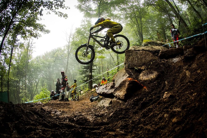 Downhill Mountain Biking_jumping off a huge rock