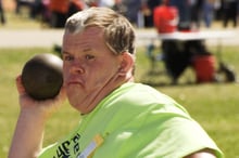 How do I throw a shot put?