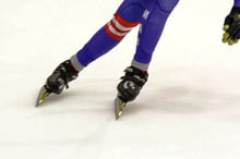 How to execute a crossover in ice skating?