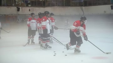 Behind the Red and White