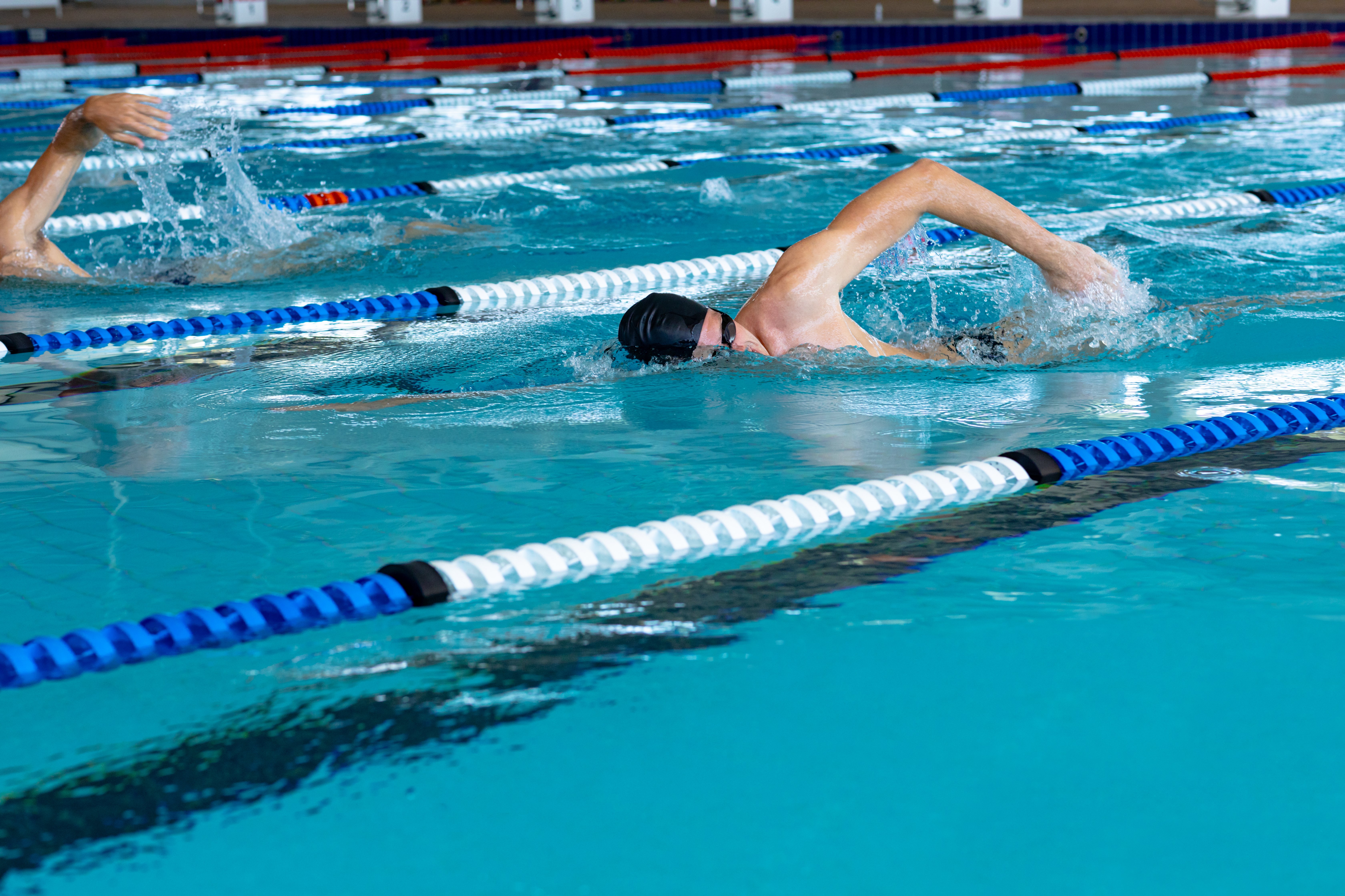 swimmers-swimming-in-the-pool-2021-04-04-18-00-39-utc