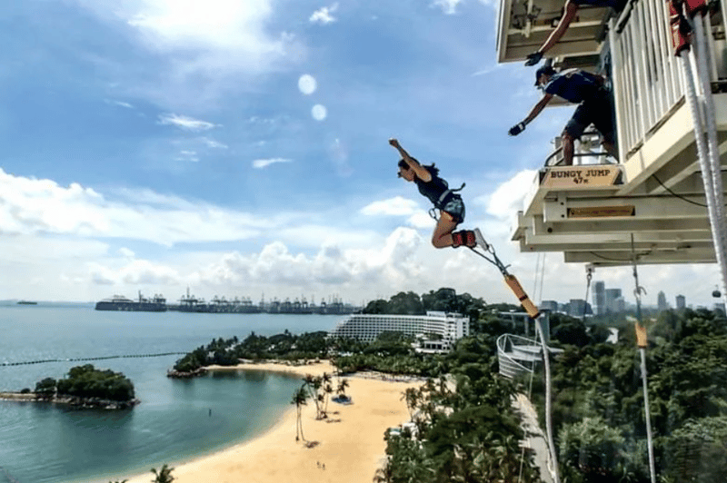 Side view of woman doing bungee jumping