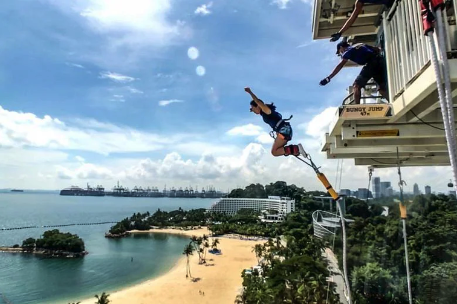 Side view of woman doing bungee jumping