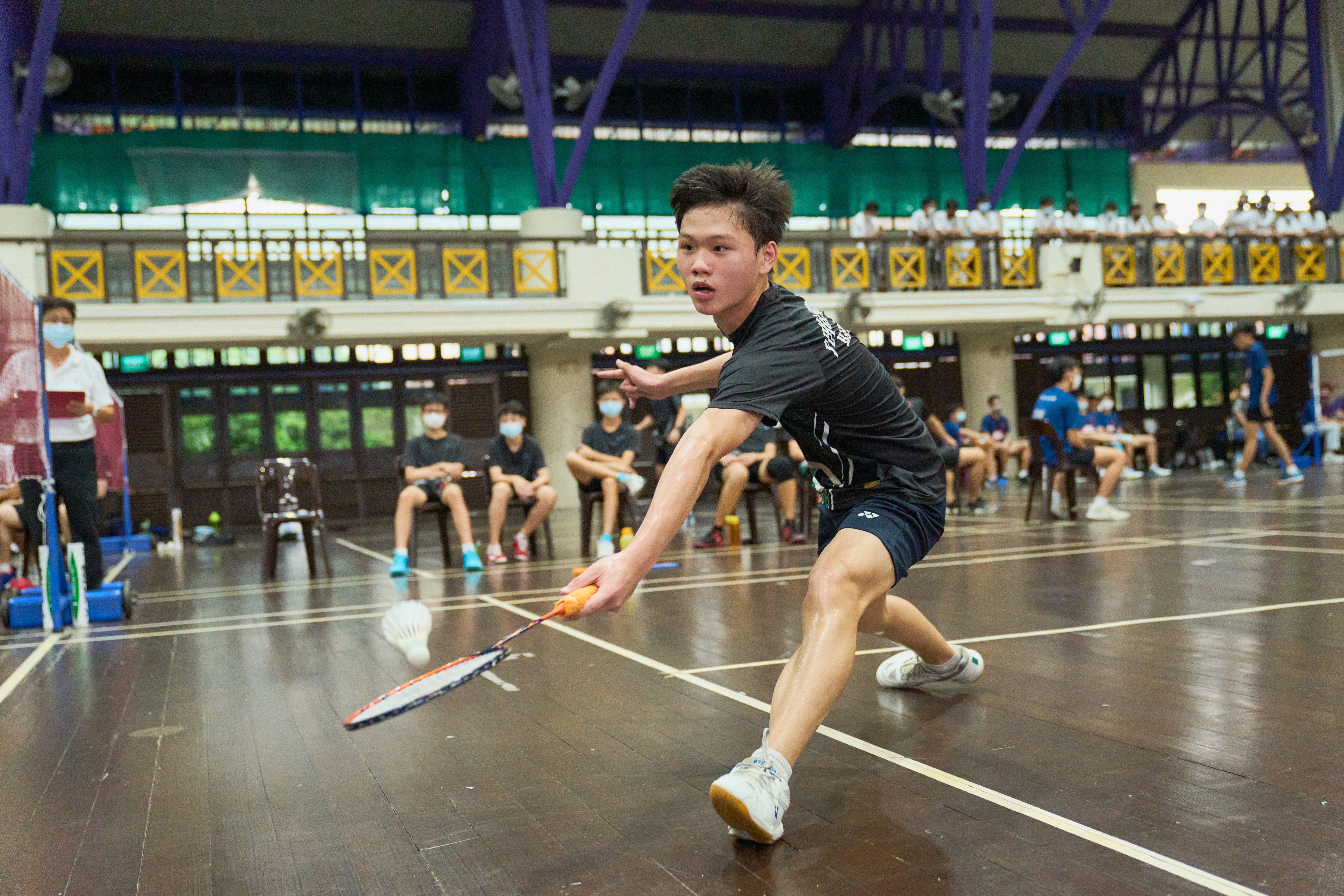 2022-04-27 Badminton B Div Boys Final Match 1 Seok Kai Aik (Fuhua Sec) returned a drop shot from Vincent Ma(HCI), Vincent Ma (HCI) won 21-4. 21-8 HCI won 4-1 Photo by Eric Koh DSC06914