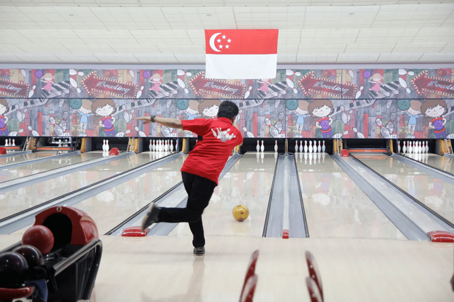 Professional bowler bowling at Orchid Bowl