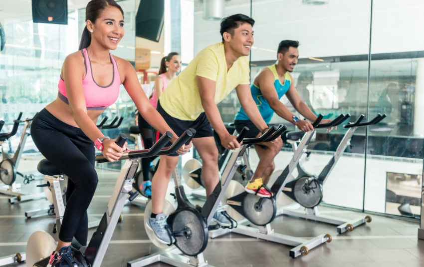 Spin class in a brightly lit studio