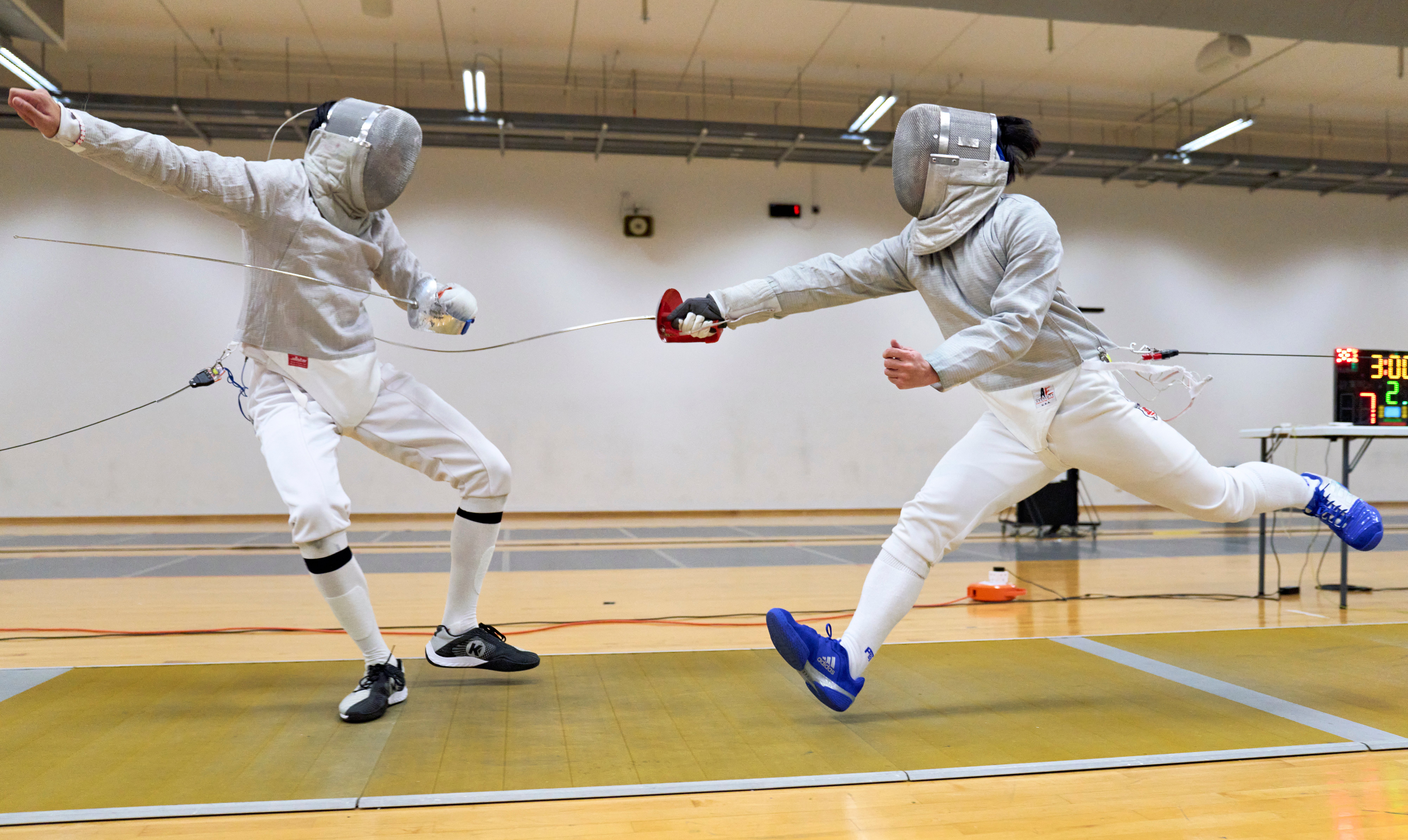 2023_04_20 Fencing Sabre A Div Boys Photo by Eric Koh, Fencers in action during the semi-final DSC08745