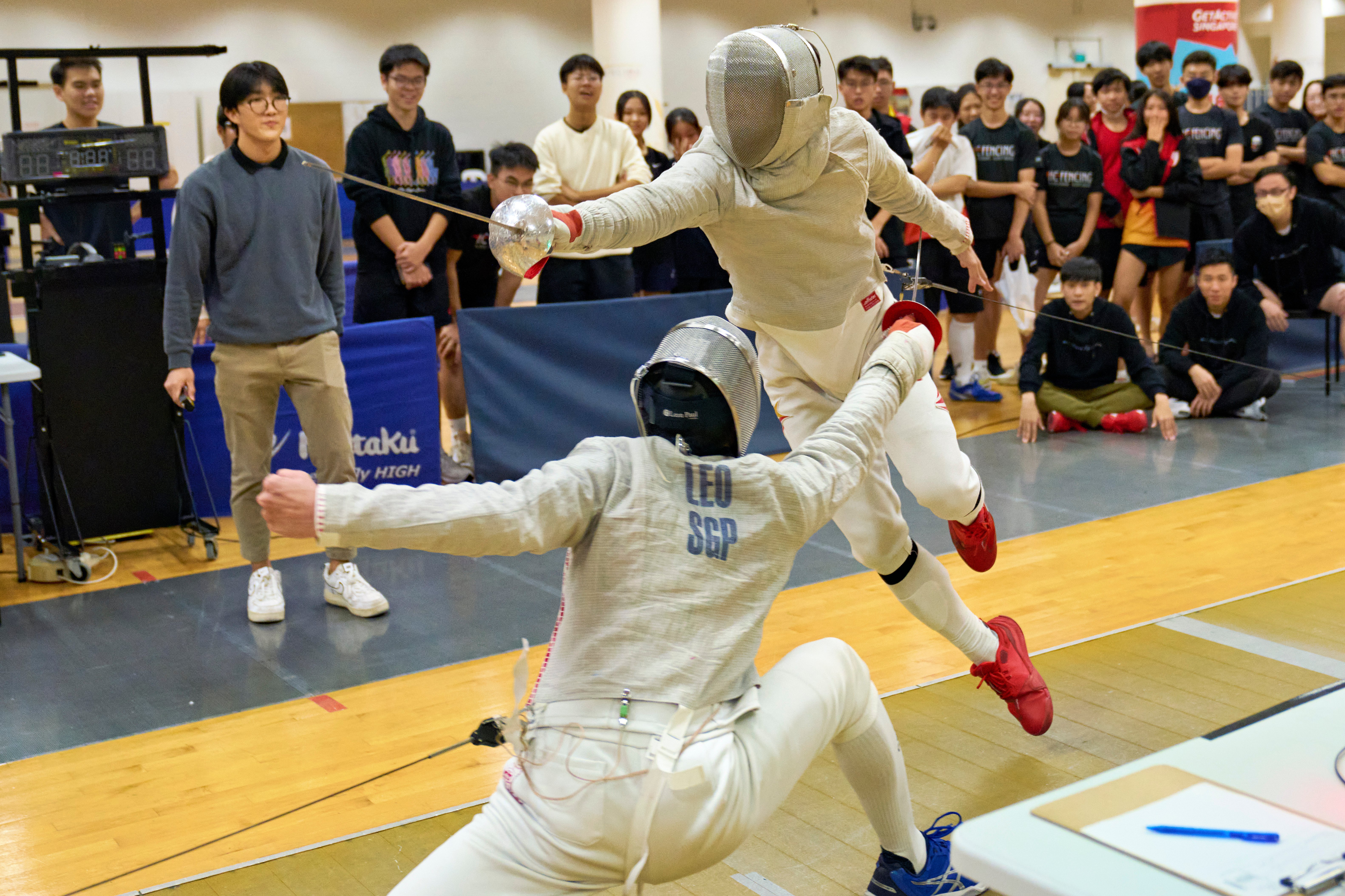2023_04_20 Fencing Sabre A Div Boys Photo by Eric Koh, Fencers in action during the semi-final DSC09052