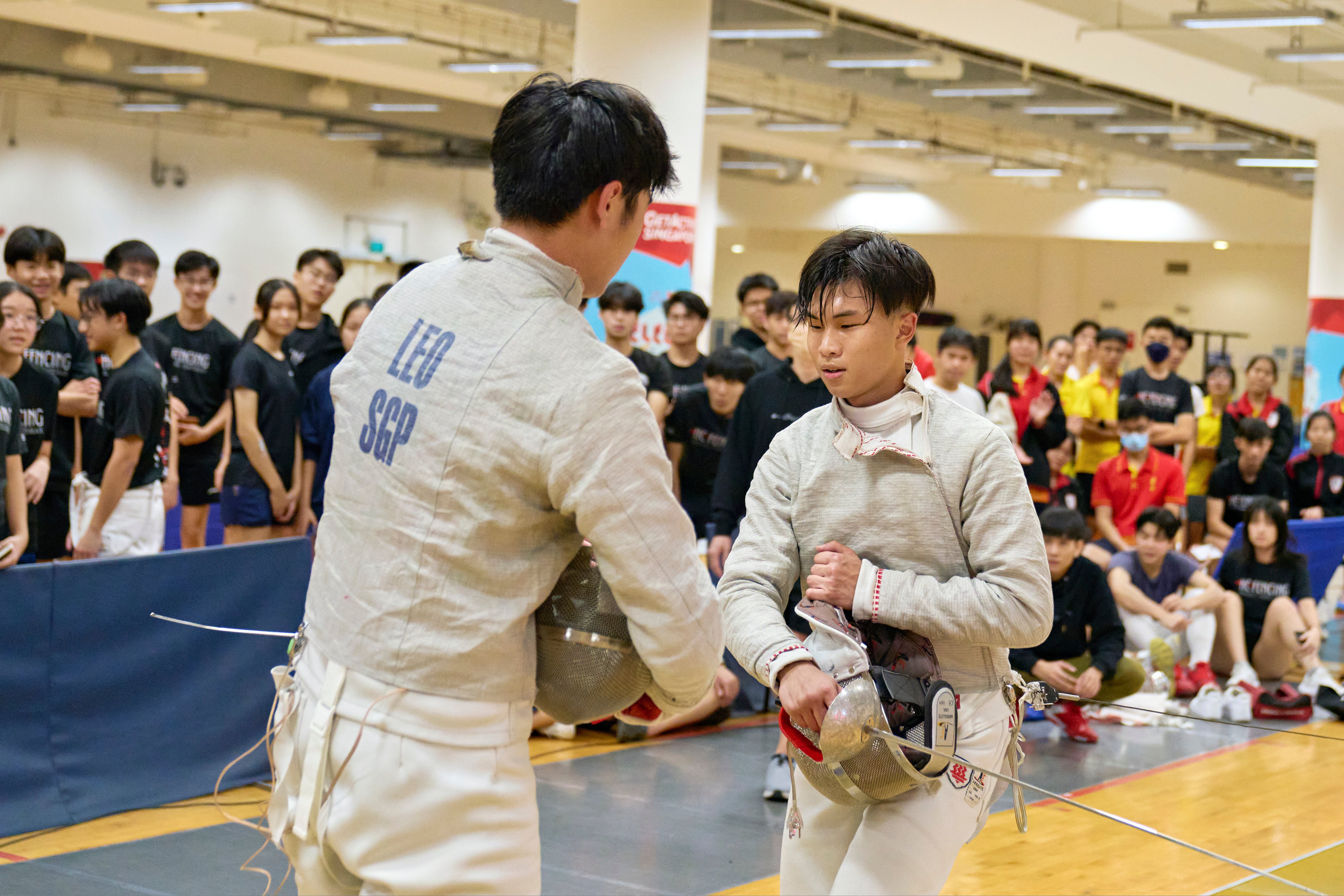 2023_04_20 Fencing Sabre A Div Boys Photo by Eric Koh, Finalists acknowlegde each other after the match DSC09586