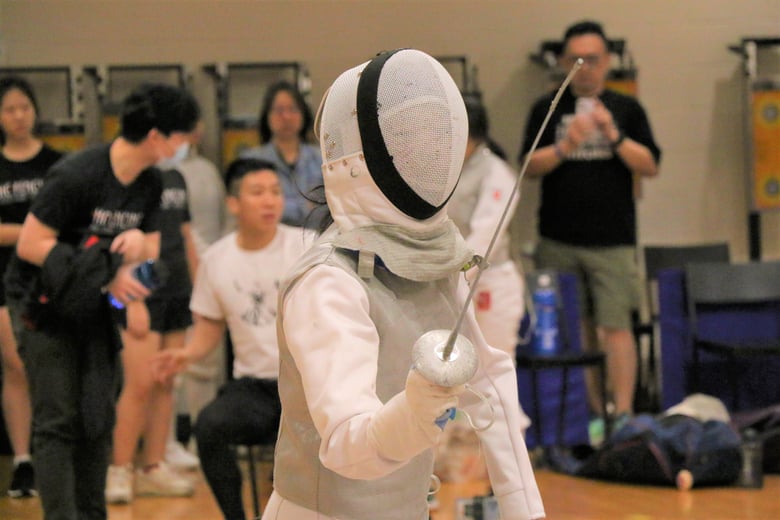 SAJC's Amelia Koh (photo) during her clash against Hwa Chong Institution's Caitlin Lim in the round of 16 stage of the Foil event. Photo Credit : Team Nila Content Producer, Anbumani Arivalagan.