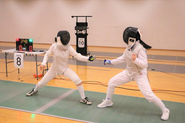 National Junior College's Mishka Lai overcomes RI's Genevieve Song 15-3 to advance into the last 8. Photo Credit : Team Nila Content Producer, Anbumani Arivalagan.
