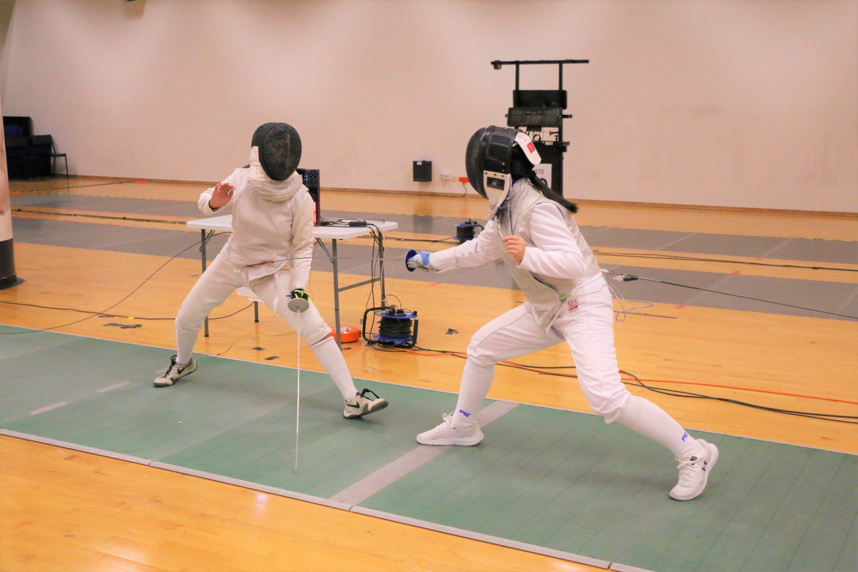 2023-04-20_NSG Fencing Womens Foil Div A_Photo by Anbumani(5)_LAI MISHKA SYIN YU vs SONG RUI QI GENEVIEVE (Elimination)