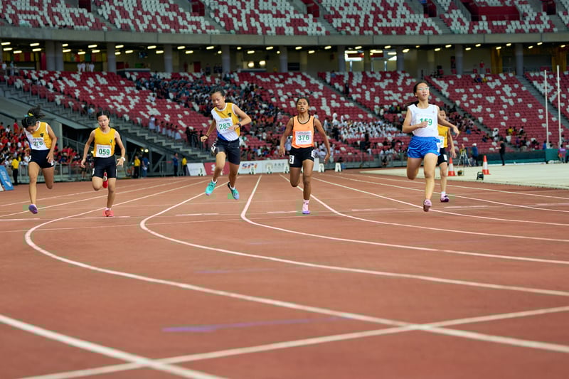 2023-04-28 NSG T&F Championships Photo by Eric Koh, Teh Xin Ni Charlotte (Bib no. 159) of SNG wins the C Div Girls 100m final DSC05752