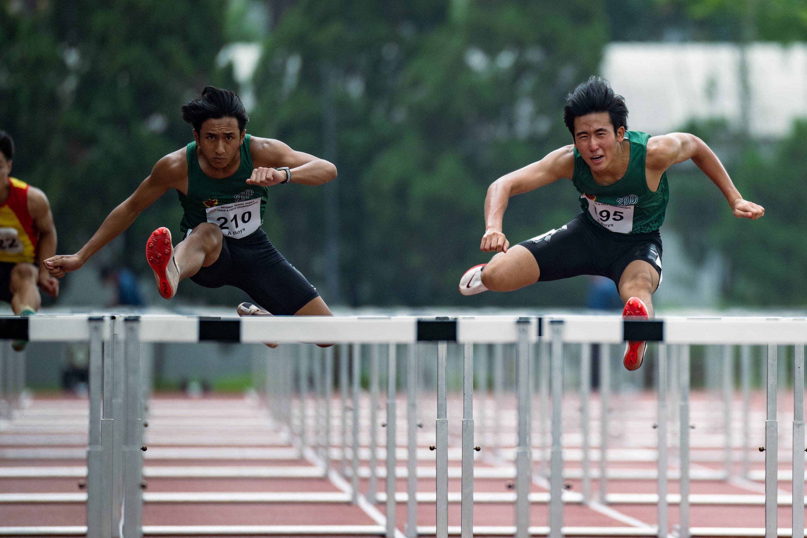 2023-04-14_National School GDSC_6462_A Boys 110 Hurdles Brandon Ang Li Yang (tag 195) of RI 1st place 15.23s and Hayden Audy Bin Haslizal (tag 210) of RI 2nd place 15.44s