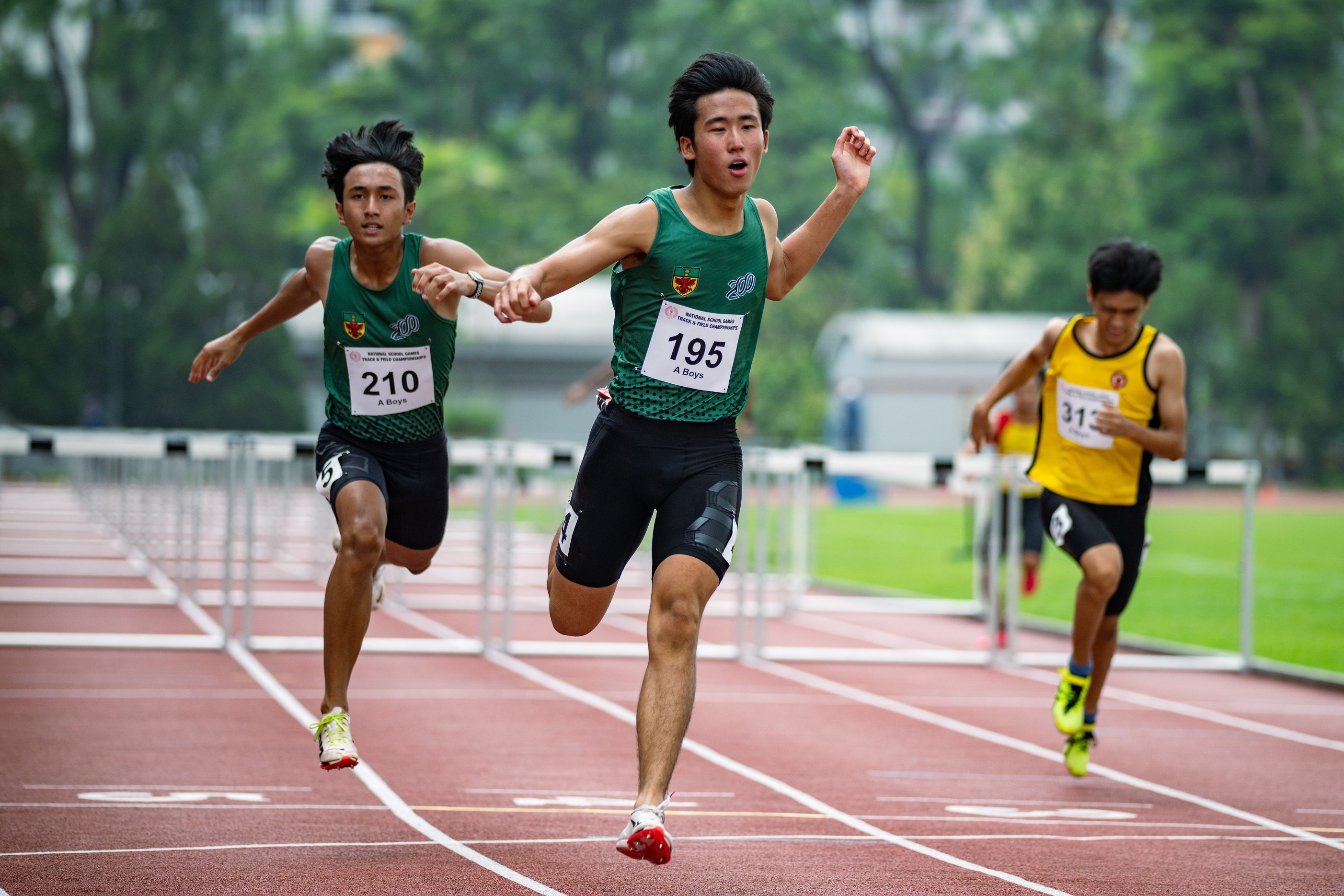 2023-04-14_National School GDSC_6492_A Boys 110 Hurdles Brandon Ang Li Yang (tag 195) of RI 1st place 15.23s and Hayden Audy Bin Haslizal (tag 210) of RI 2nd place 15.44s