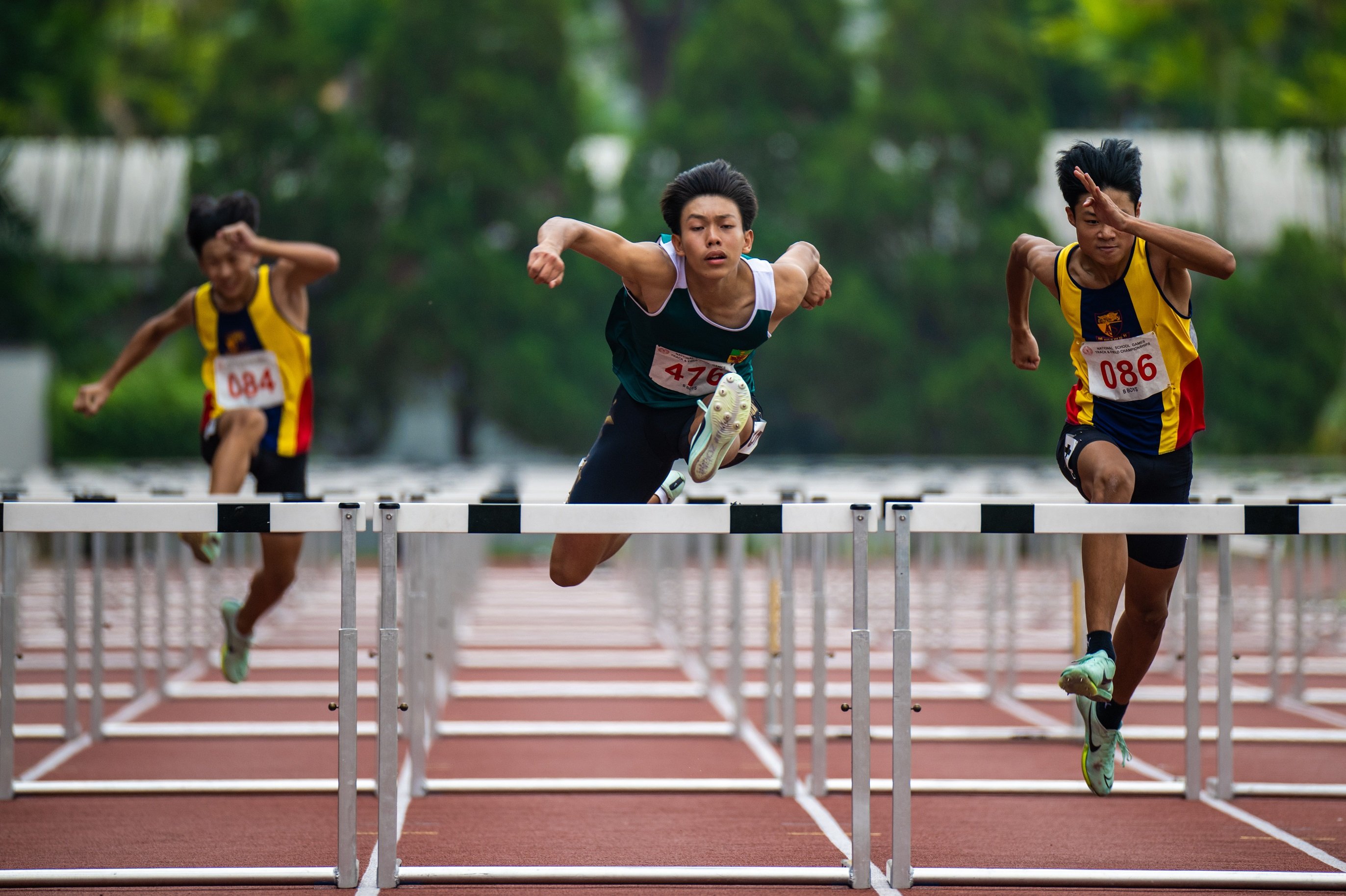 2023-04-14_National School Game T&F 2023 (PM)_Photo by Tom Ng Kok Leong_DSC_6344_B Boys 110m Hurdles Garrett Chua Jean (tag 476) of RI 1st place 14.33s