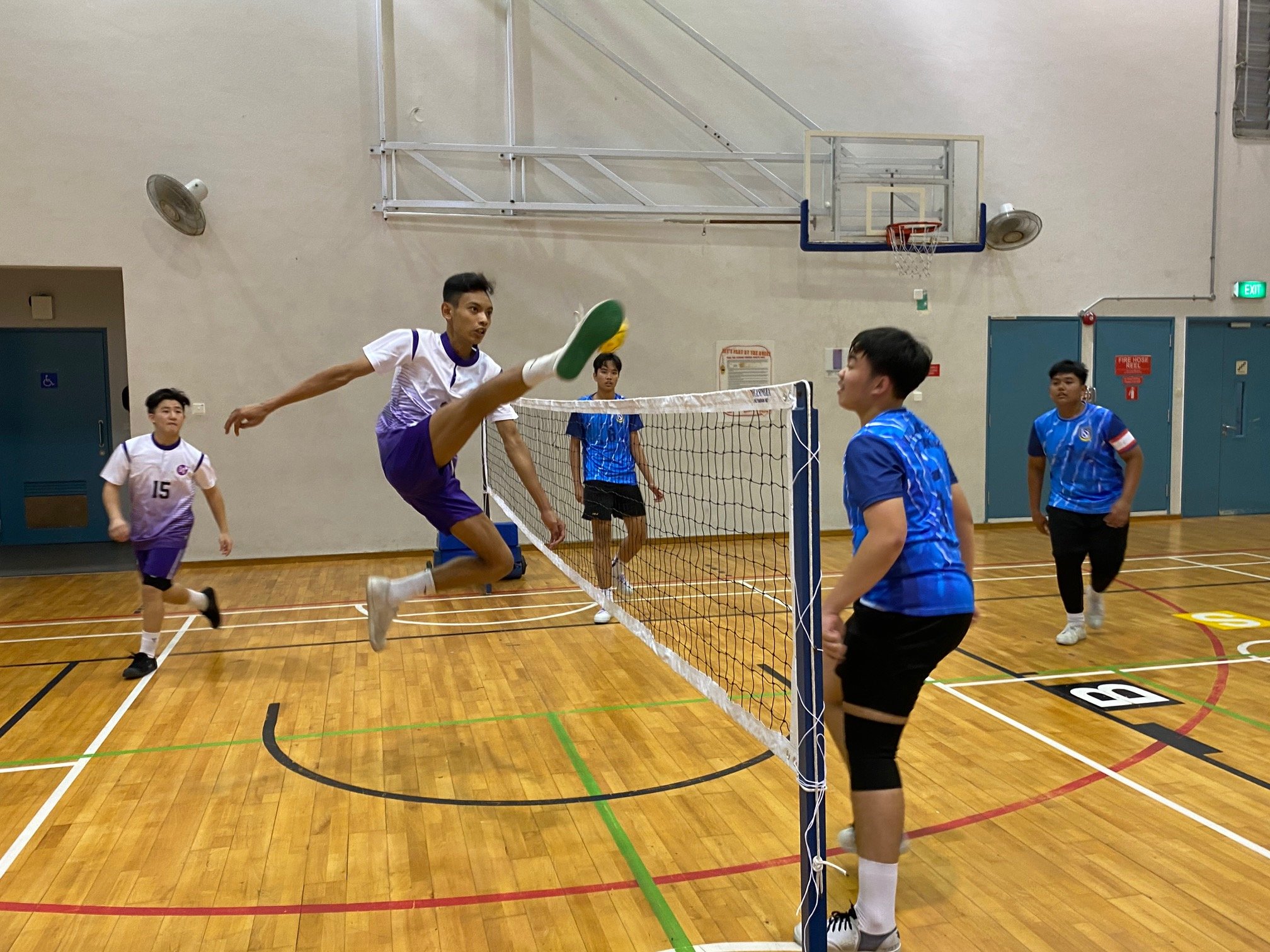 NSG A Div sepak takraw - Woodlands (blue) vs Northlight (purple) first regu 4-1