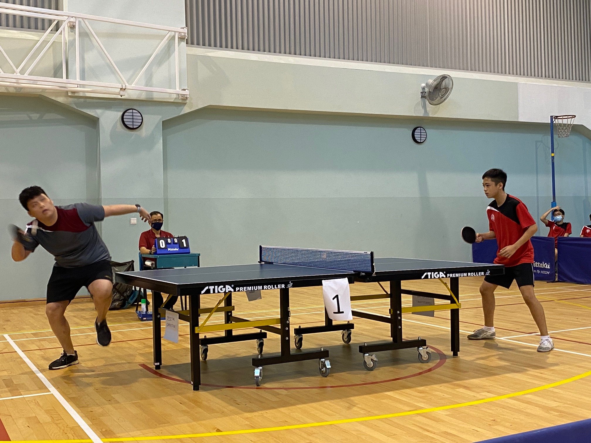 NSG B Div boys table tennis - Pasir Ris Crest (grey) vs Victoria School (red) 1st singles