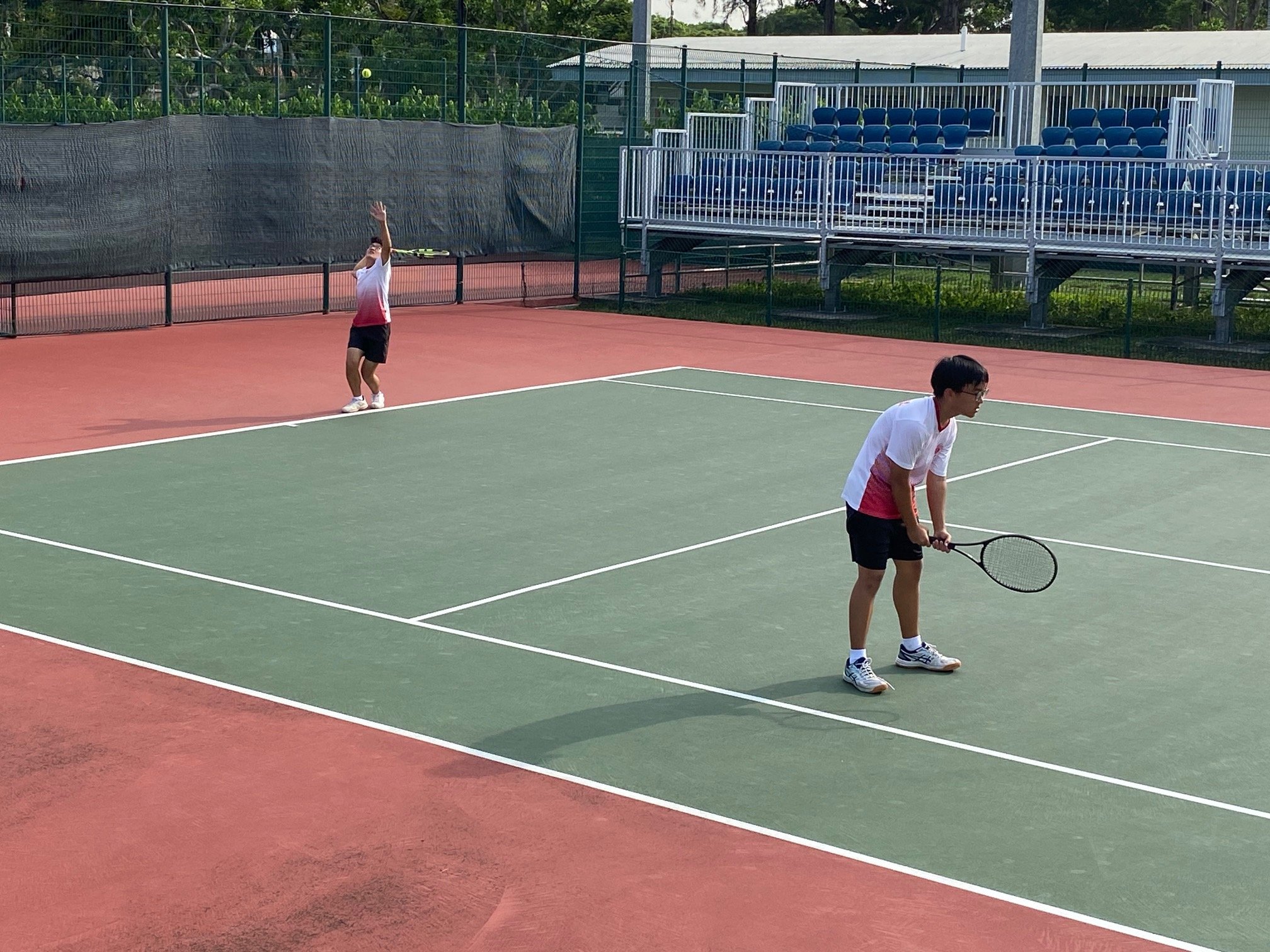 NSG B Div boys tennis - Victoria Schools doubles pair Matthew William Tan and Joshua Chan in action at Kallang Tennis Centre