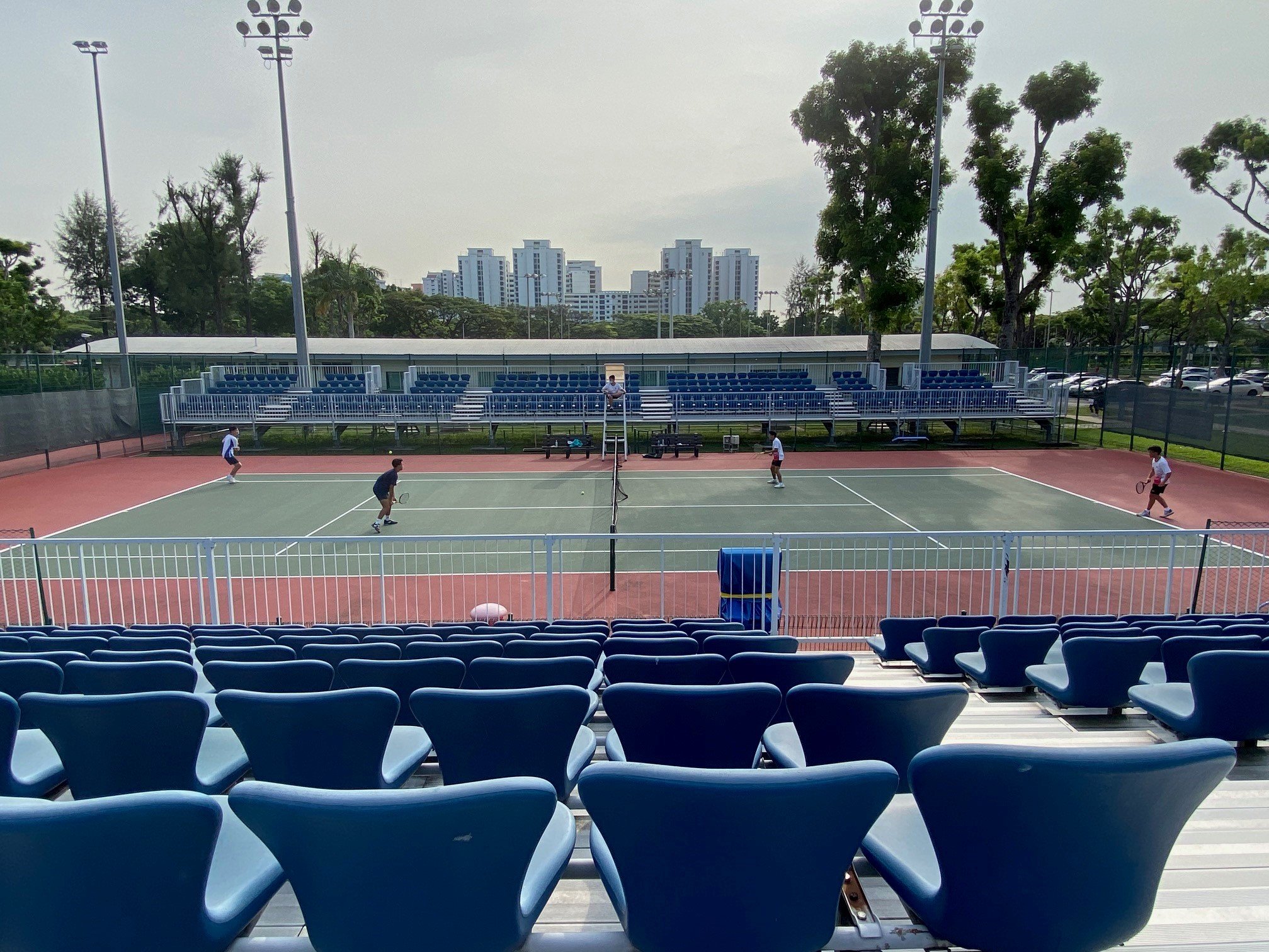 NSG B Div boys tennis -- second doubles match in action at Kallang Tennis Centre