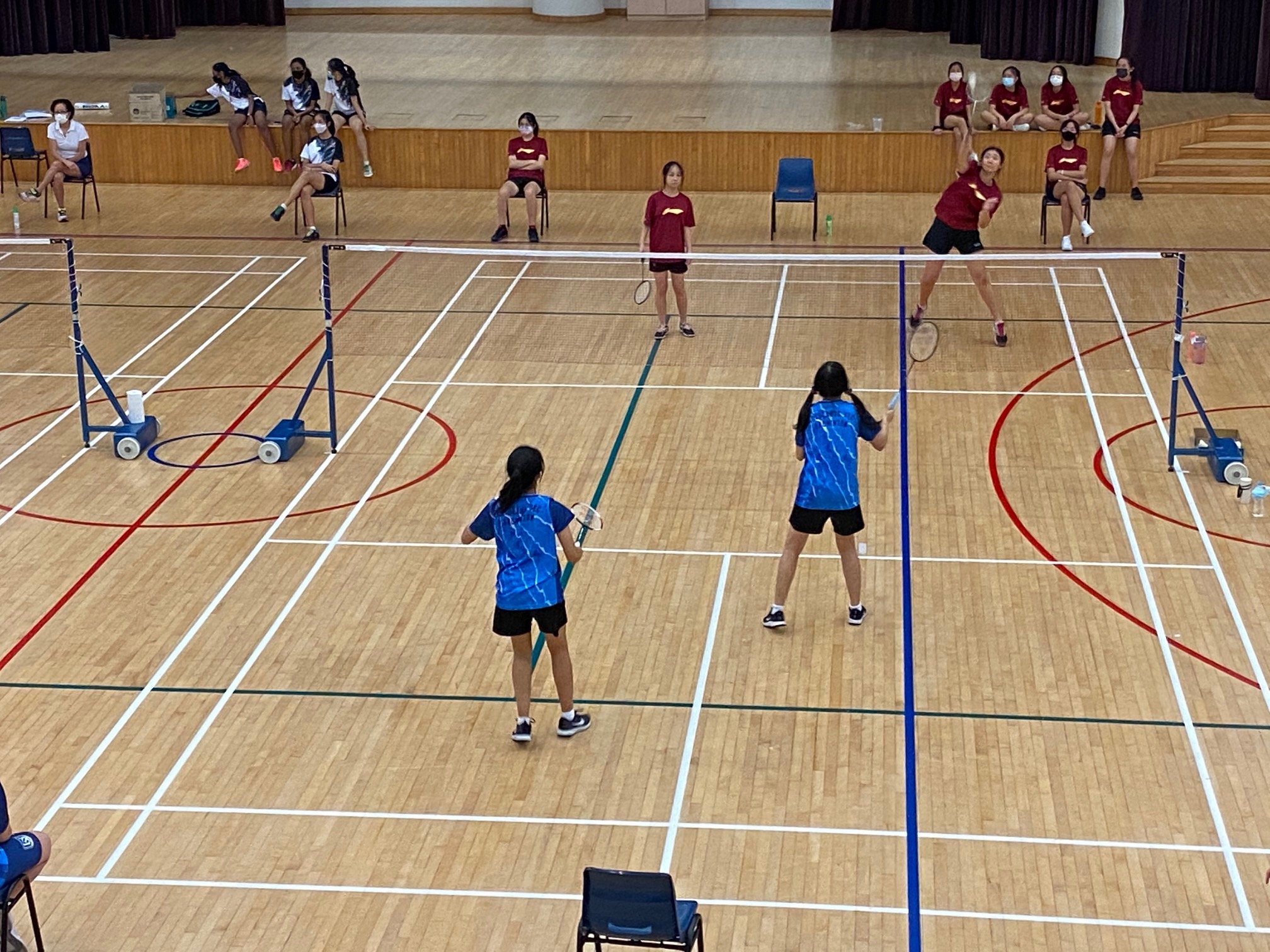 NSG B Div girls badminton - Compassvale (red) vs Woodlands (blue) first doubles