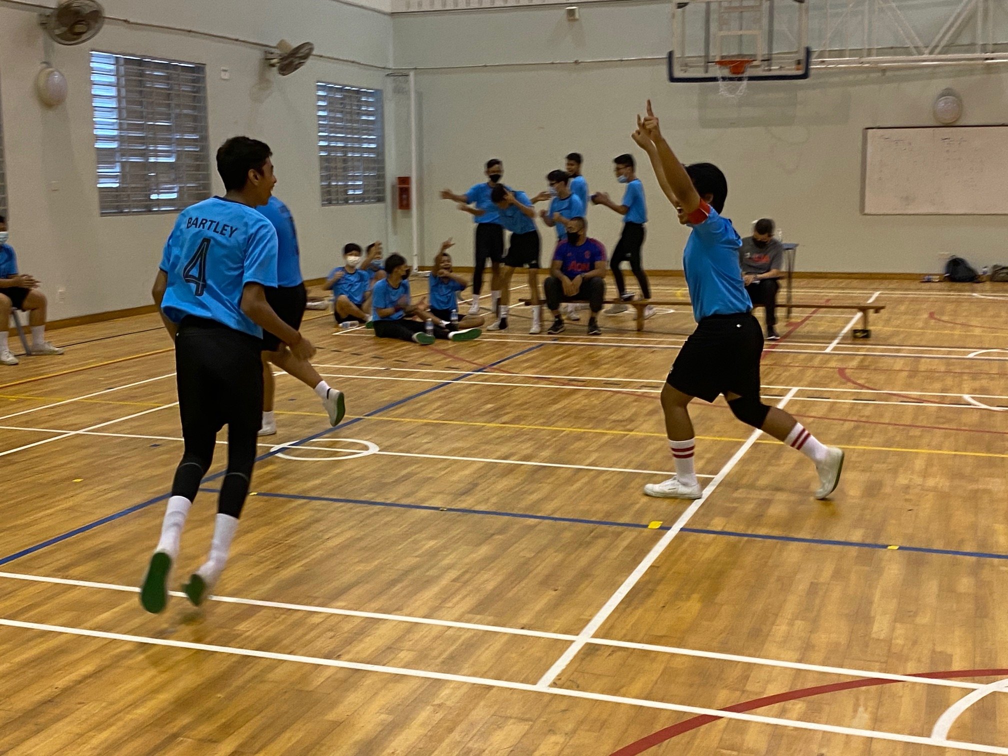 NSG B Div sepak takraw - Bartley Sec 1st regu team cheering after their win