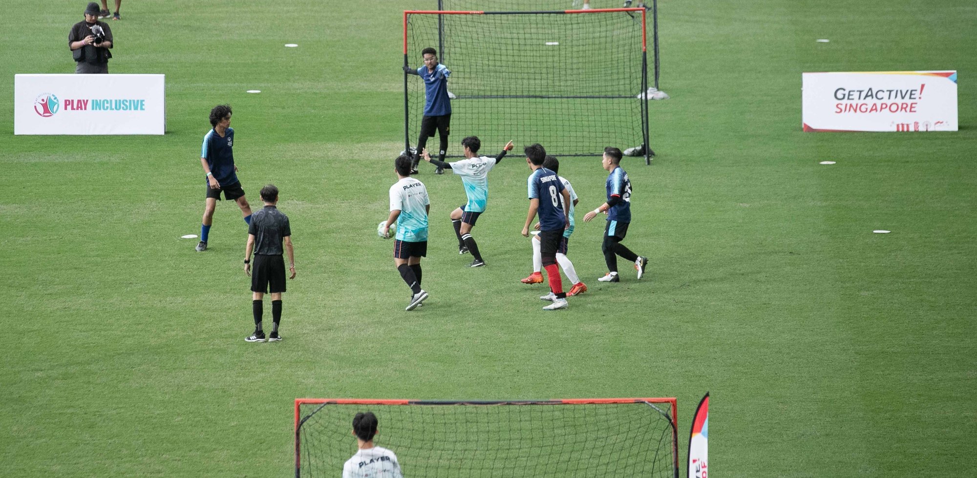 Photo of a group of players during Play Inclusive football match