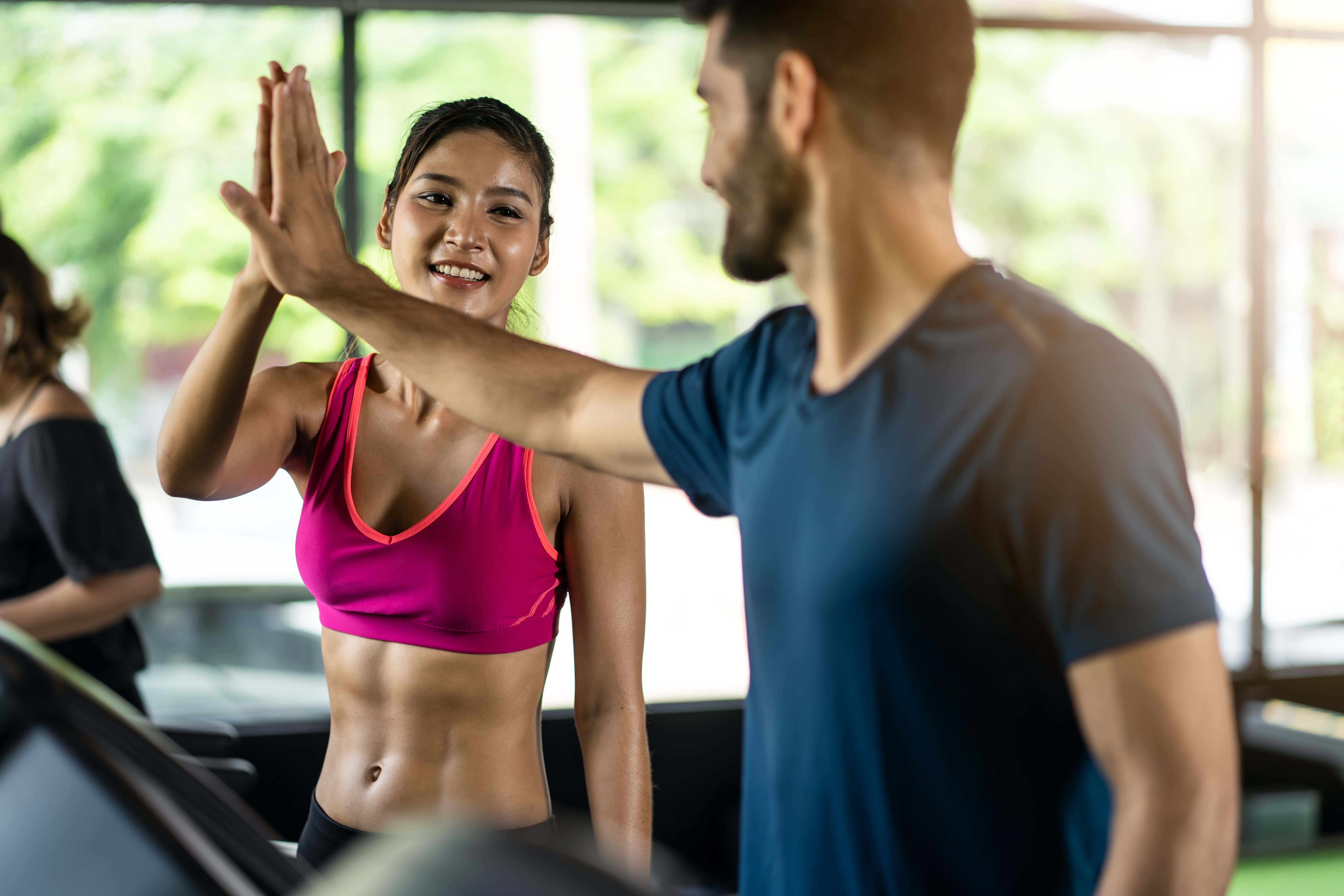 asian-female-athlete-running-on-treadmill-or-machi-2021-11-03-05-26-33-utc