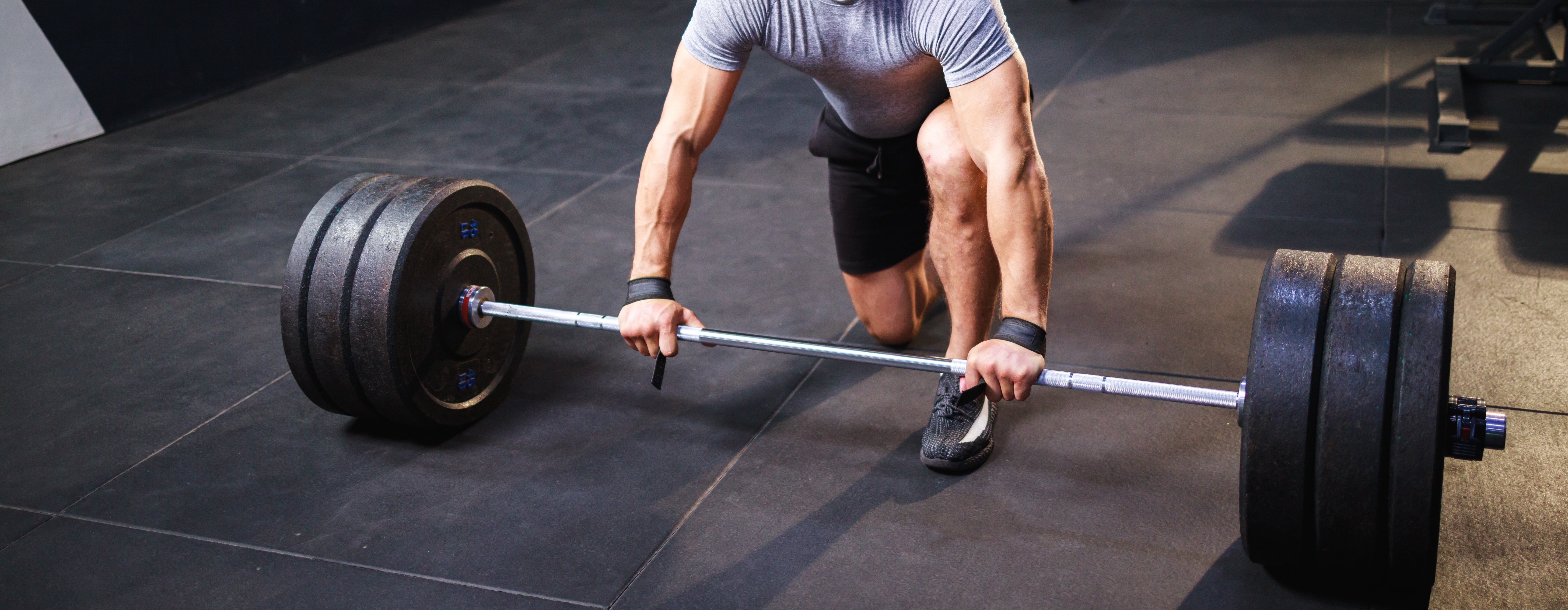 close-up-of-hand-of-man-doing-deadlift-exercise-in-2022-10-26-02-26-53-utc