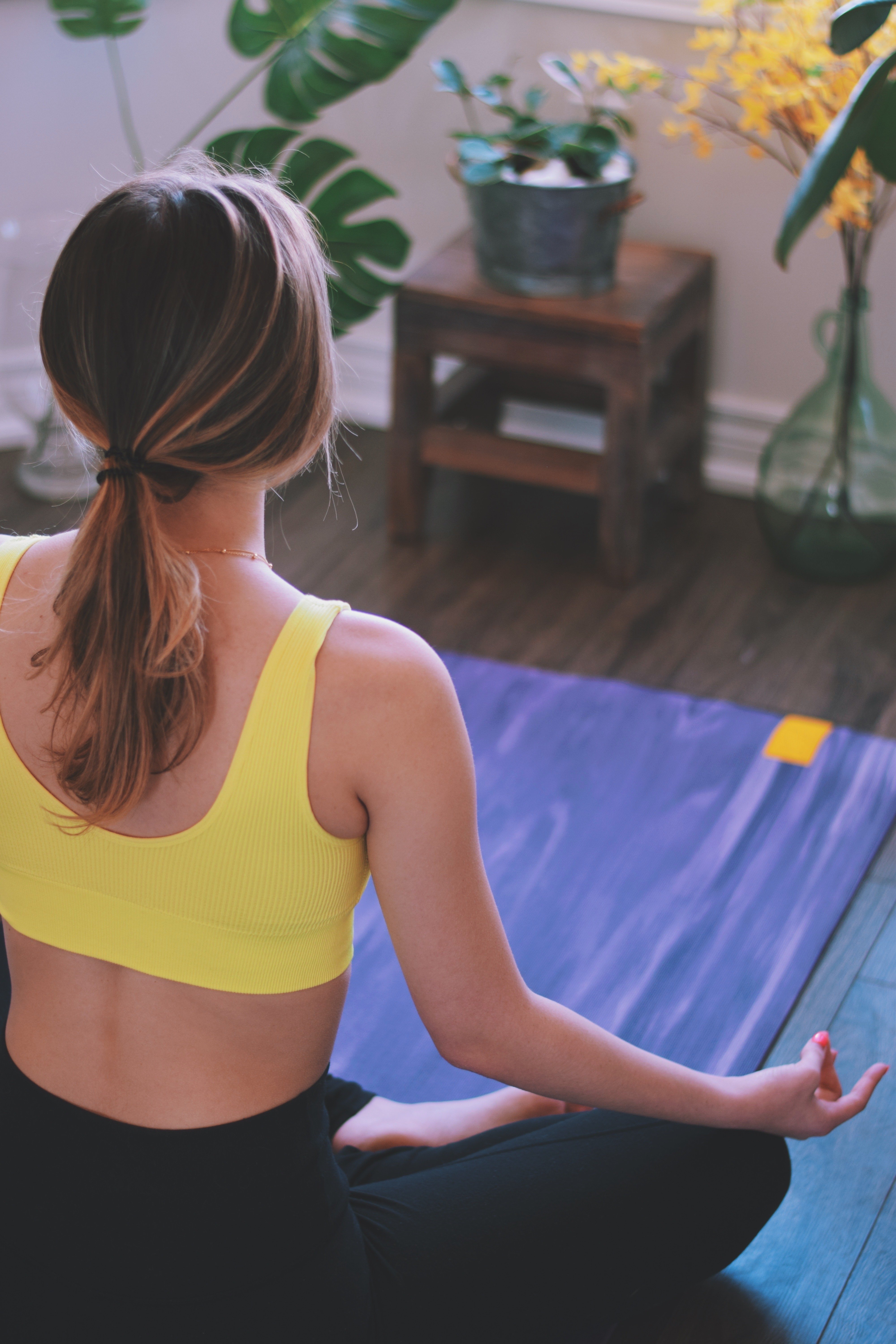 young-teenage-girl-practicing-yoga-at-home-on-a-yo-2022-08-01-04-19-24-utc